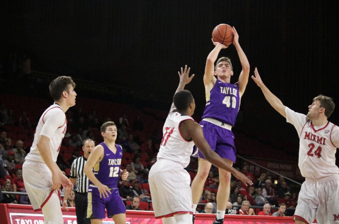 Luke Huffer Attempts a shot under pressure